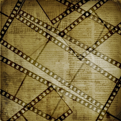 Filmstrip negatives overlaid upon a background script whose text is too obscured to read.