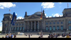 A blue ballet shoe guides tourists at the Reichstag, Berlin